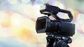 Video,Camera,With,Blur,Background,For,Journalist,Interview,Broadcasting,Reporter