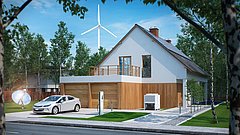 Moderne Einfamilienhaus mit Holzverkleidung, Solarpanelen auf dem Dach, Elektroauto an Ladestation, Windrad im Hintergrund, umgeben von Bäumen.
