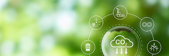 Verringerung der CO2-Emissionen Ziel-Symbol auf grünem Hintergrund