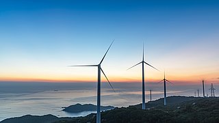 Wind,Turbines,On,The,Coast,In,The,Production,Of,Green
