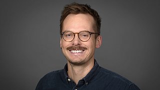Portraitbild von Jannis Moss