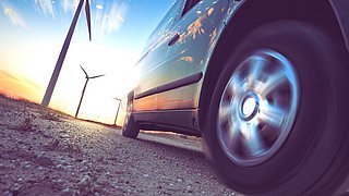 Wind,Mills,And,Tire,Car,Detail.electricity,And,Ecology.,Industry,Of